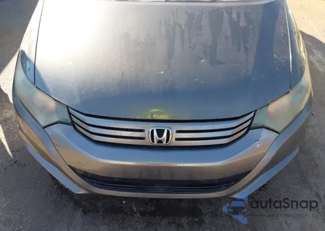 2010 Honda Insight Ex z USA, uszkodzony, nr VIN JHMZE2H7XAS004485